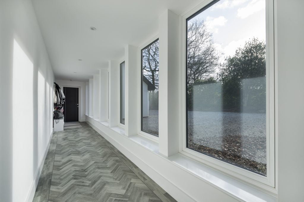 hallway interior with slim windows